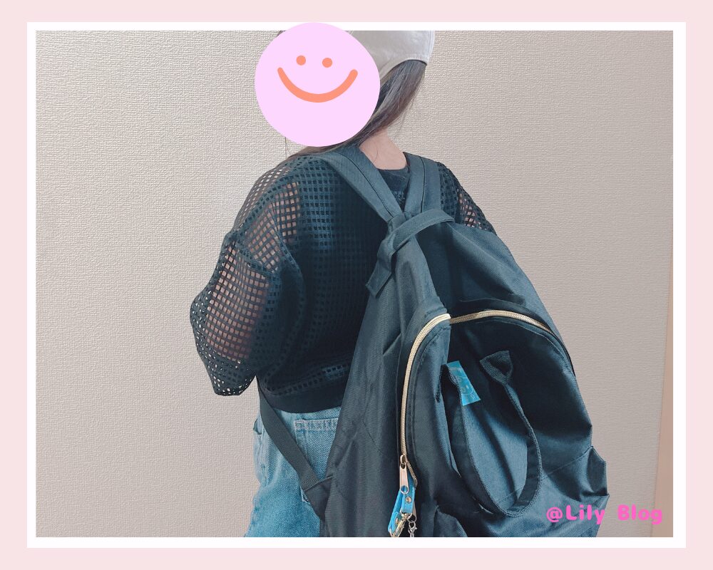 合宿 荷物 リュックを背負っているところ